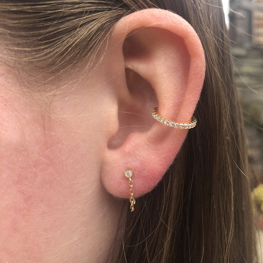 Kris Nations – Ohrklemme mit rundem Kristall