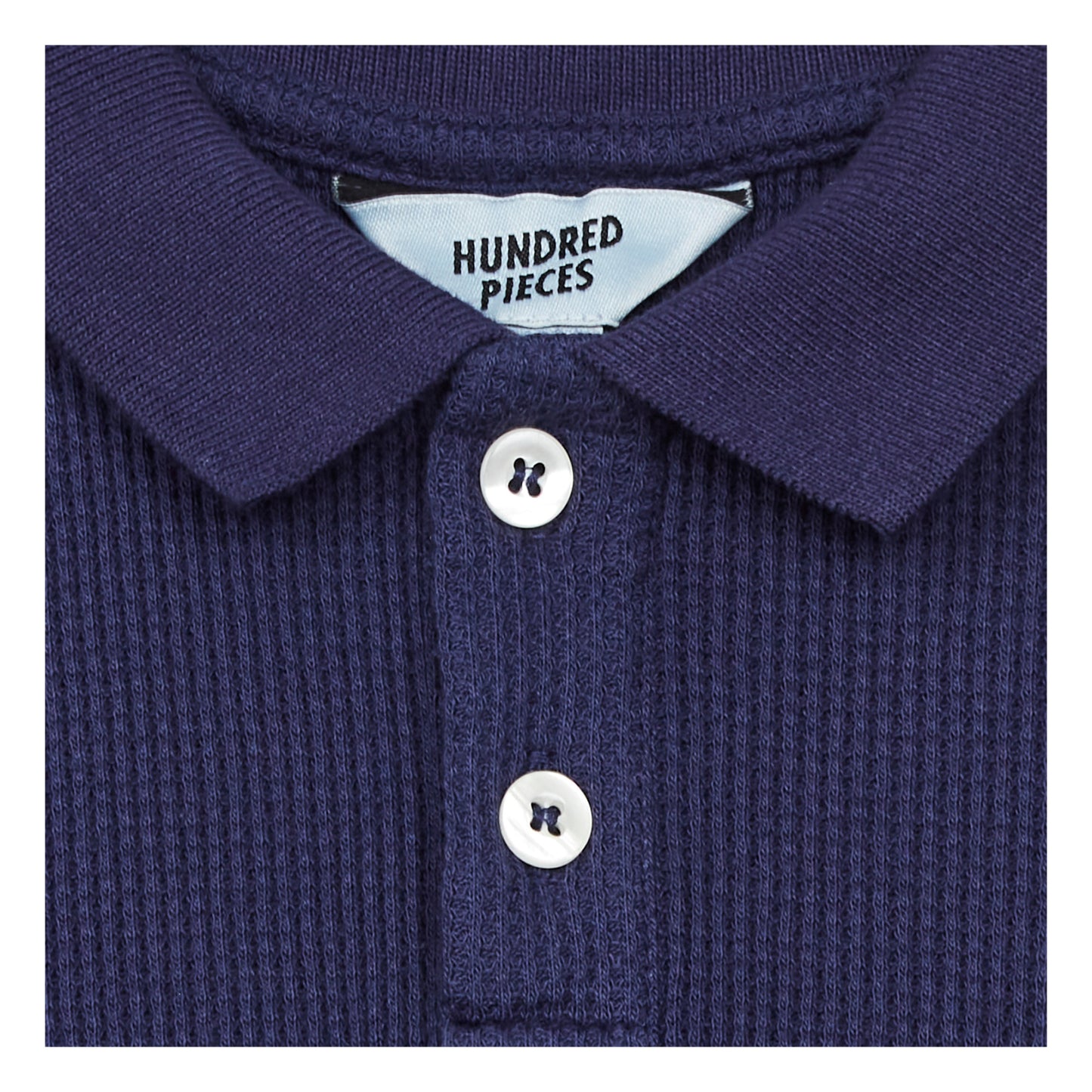 Hundred Pieces – Waffel-Poloshirt